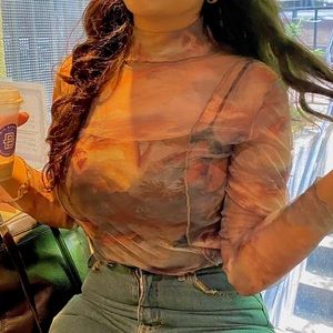 Angelic Figures Mock Neck Sheer Top